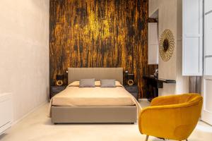 Postel nebo postele na pokoji v ubytování Flower Rooms Cagliari + 22 fotografií