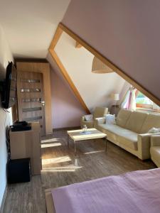 Posteľ alebo postele v izbe v ubytovaní Apartment U Lejbusia