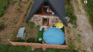 an overhead view of a house with a swimming pool at Tenora in Rize
