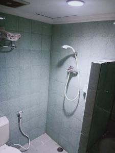 Koupelna v ubytování Puri Mega Hotel