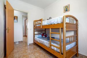Cama o camas de una habitación en La caseta dels iaios