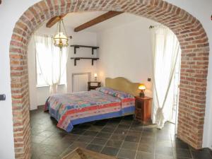 En eller flere senge i et værelse på Casa Serra