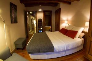 a bedroom with a large bed in a room at El Tarter - Andorra in El Tarter