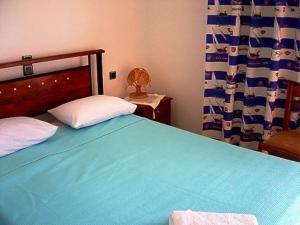 Postel nebo postele na pokoji v ubytování Dimitra Apartments