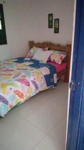 Cama ou camas em um quarto em Apartamento en Getsemaní