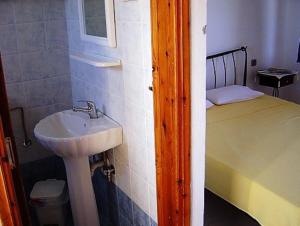 Postel nebo postele na pokoji v ubytování Dimitra Apartments