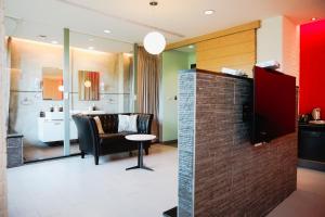 Kuchyň nebo kuchyňský kout v ubytování 823 Tourist Hotel