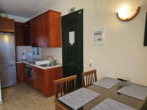 Kuchyň nebo kuchyňský kout v ubytování Corfu Glyfada Apartment 46