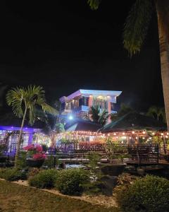 a building with lights on it at night at Casa Jedliana in Santa Rosa