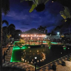 a view of a pool at night with lights at Casa Jedliana in Santa Rosa