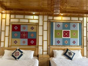 Postel nebo postele na pokoji v ubytování Huân Đậu Đậu Homestay