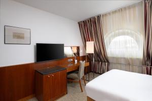 Televízia a/alebo spoločenská miestnosť v ubytovaní K+K Hotel Opera