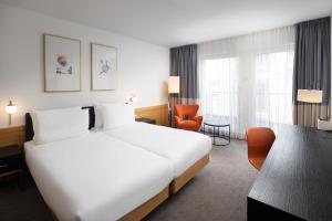 Posteľ alebo postele v izbe v ubytovaní K+K Hotel Opera