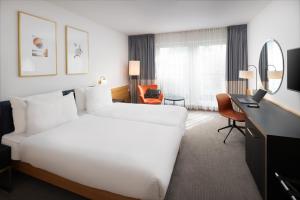 Posteľ alebo postele v izbe v ubytovaní K+K Hotel Opera