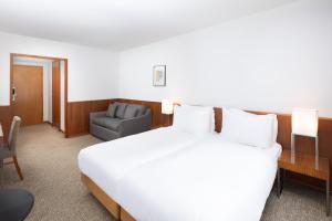 Posteľ alebo postele v izbe v ubytovaní K+K Hotel Opera