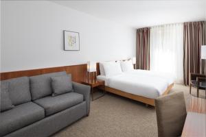 Posteľ alebo postele v izbe v ubytovaní K+K Hotel Opera