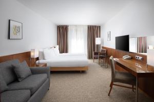 Televízia a/alebo spoločenská miestnosť v ubytovaní K+K Hotel Opera