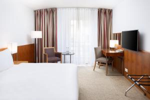 Televízia a/alebo spoločenská miestnosť v ubytovaní K+K Hotel Opera
