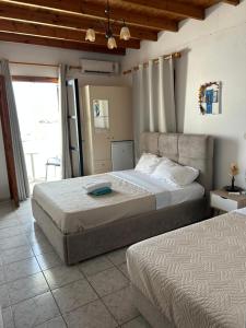 Galería fotográfica de Notos Rooms en Loutro