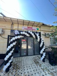 a entrance to a building with a arch in front at LOONA FAMILY HOSTEL in Tashkent