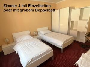 a room with two beds in a room at Sommerfrische Waldviertel in Kirchberg am Walde