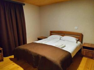 Postel nebo postele na pokoji v ubytování Hotel Kepney