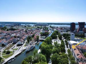 an aerial view of a city with a river at JS apartamentai su savarankišku įsiregistravimu in Klaipėda