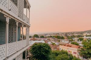 a view of the city from a balcony at Amante Narikala Boutique Hotel in Tbilisi City