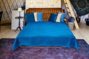 Letto o letti in una camera di Jurta Pod Brzozami