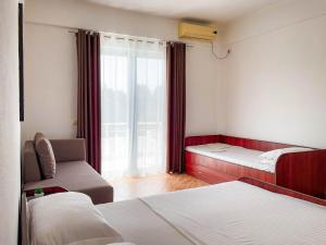 Postel nebo postele na pokoji v ubytování Villa Antonio + 37 fotografií