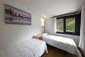 Letto o letti in una camera di La Solana Apartaments & Spa