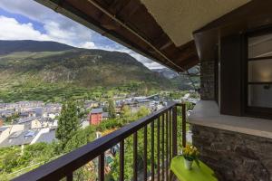 a balcony with a view of a city at La Solana Apartaments & Spa in Encamp