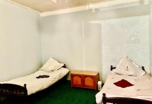Un ou plusieurs lits dans un hébergement de l'établissement Ismayilli Bag Evi, Vacation Home