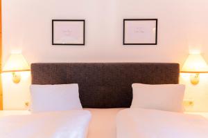 A bed or beds in a room at Pon-Apart