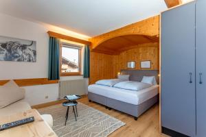 A bed or beds in a room at Pon-Apart