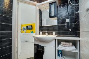 Koupelna v ubytování Charmy Studio Lux