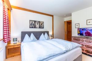 A bed or beds in a room at Pon-Apart