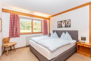 A bed or beds in a room at Pon-Apart