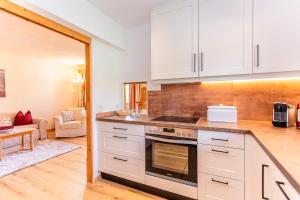 A kitchen or kitchenette at Pon-Apart