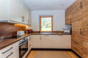 A kitchen or kitchenette at Pon-Apart