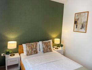 Postel nebo postele na pokoji v ubytování Zona Optimizma accommodation & SPA