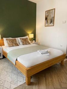 Postel nebo postele na pokoji v ubytování Zona Optimizma accommodation & SPA