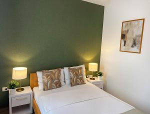 Postel nebo postele na pokoji v ubytování Zona Optimizma accommodation & SPA