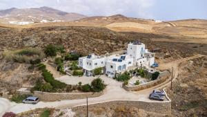 an aerial view of a white house in a desert at Afroditi Ftelia Yasemi b in Elia +14 photos