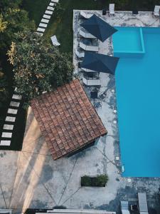 an overhead view of a tile roof with an umbrella at Kobuleti Garden Inn in K'obulet'i