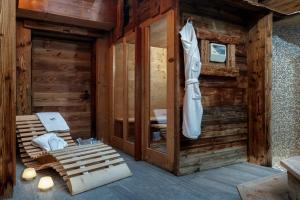 a log cabin with two beds in a room at Francois Boutique Rooms - Matterhorn Retreat & SPA in Cervinia in Breuil-Cervinia +61 photos