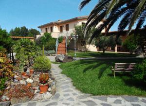 A garden outside Agriturismo S´Aranada