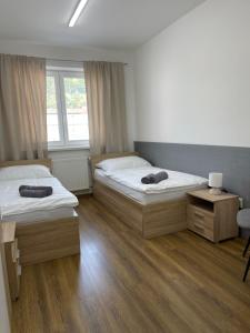 Posteľ alebo postele v izbe v ubytovaní Ubytovanie HAMAR 17