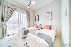 Gallery image of Spectacular 3BR Townhouse with Assistant Room and Private Pool at DAMAC Hills 2 Dubailand by Deluxe Holiday Homes in Dubai
