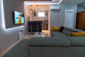 Kuchyň nebo kuchyňský kout v ubytování Level 2 Spa Apartman